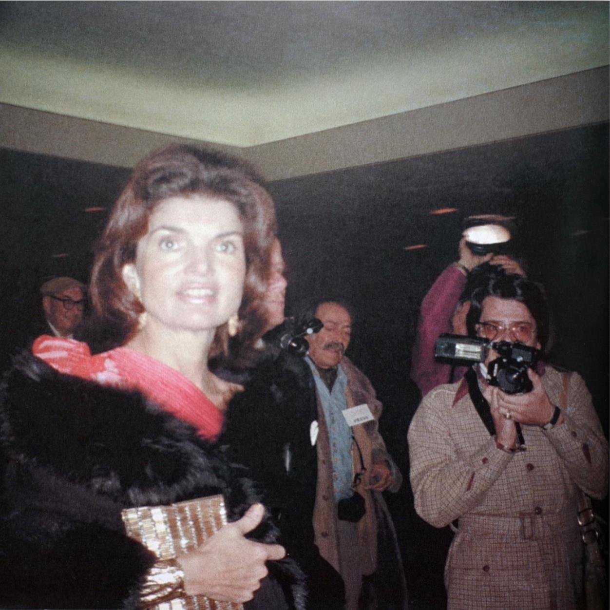 Jacqueline Kennedy Onassis in the parking garage at the Metropolitan Opera House, New York City, n.d. - Gary Lee Boas 